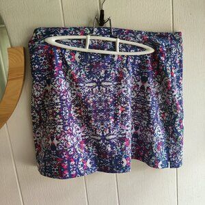 Skort in a pleasant pattern of red, white and blue print. Quick dry . Sz L
